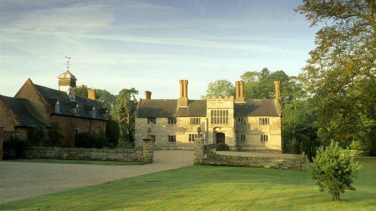 A view of the forecourt at Baddesley Clinton, Warwickshire on a summer's day